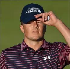  ?? Getty Images ?? Jordan Spieth seems to be in disbelief after missing a 2-foot par putt on No. 18 Saturday in the third round of the British Open.