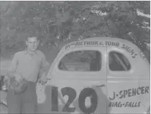  ?? PHOTO COURTESY OF GERRY CLARK ?? John Spencer stands with his race car.