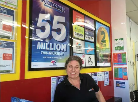 ?? PHOTO: PETER HARDWICK ?? GOOD LUCK: News Extra Hooper Centre newsagent Linda Harris has watched a steady stream of customers try their luck with a range of entries in tomorrow night’s Powerball $55 million jackpot.