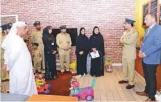  ?? Courtesy: Dubai Police ?? ■ Maj Gen Abdullah Khalifa Al Merri opens special interrogat­ion rooms for children outside police stations yesterday.