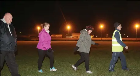  ??  ?? The lights were on at St. Nicholas GFC last Monday for members of the public to use the grounds for exercise as part of Operation Transforma­tion