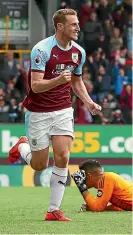  ?? GETTY IMAGES ?? All Whites striker Chris Wood celebrates his second goal in Burnley’s crucial 2-0 win over Cardiff City.