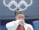  ?? ASHLEY LANDIS — THE ASSOCIATED PRESS ?? American gymnast Simone Biles wasn’t in the right “headspace” to compete and withdrew from multiple events at the 2021 Tokyo Olympics to protect herself.