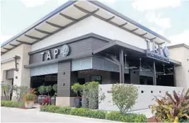  ??  ?? Tap 42 Craft Kitchen & Bar at the Tower Shops in Davie. Open about three weeks, business at the restaurant has been “ridiculous,” manager Mark Hunter says.