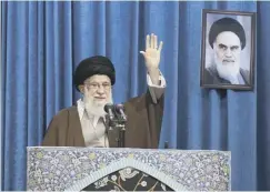  ??  ?? 0 The Ayatollah waves to his followers