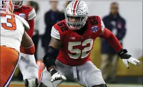  ??  ?? Ohio State offensive lineman Wyatt Davis (52) is shown during the first half of the 2019 Fiesta Bowl game against Clemson in Glendale, Ariz.