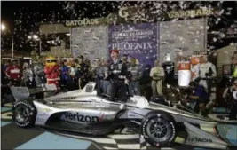  ?? RICK SCUTERI — THE ASSOCIATED PRESS ?? Josef Newgarden celebrates after winning an IndyCar race April 7 at Phoenix Internatio­nal Raceway in Avondale, Ariz.