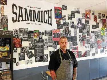  ?? CHAD FELTON — THE NEWS-HERALD ?? Jack Flaps chef-owner Randy Carter at his newest eatery, Sammich, located at 651 E. 185th St. on June 29.