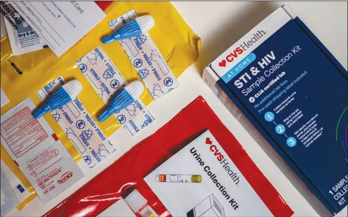  ?? PHOTOS BY ERIC HARKLEROAD / KHN ?? CVS’ at-home tests that screen for HIV and other sexually transmitte­d infections can be bought in stores and online. The kit is priced at $99.99.
