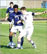  ?? Photo by Randy Moll ?? Braxton Gunneman, Gentry senior, attempts to take the ball from a Subiaco Academy player on March 31.