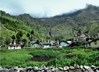  ??  ?? Cosy wooden huts, pine forests, and waterfalls greet you in Lachung.