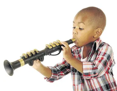  ?? / ISTOCK ?? It’s important to spark a child’s interest in music early on, experts argue.