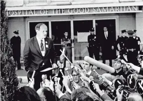  ?? AP ?? Frank Mankiewicz, press secretary for Robert Kennedy, told journalist­s Kennedy emerged from three hours of surgery in “extremely critical condition.”