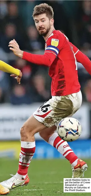  ?? ?? Jacob Maddox looks to get the better of Crewe Alexandra’s Luke Murphy on Saturday at the Pirelli Stadium.