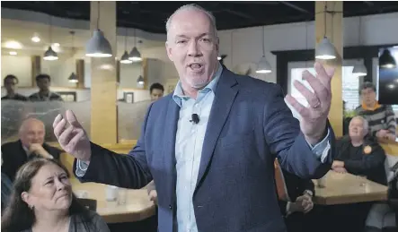 ?? DARRYL DYCK/THE CANADIAN PRESS ?? Campaignin­g to become premier of B.C., NDP Leader John Horgan has put Alberta Premier Rachel Notley in a tight spot. They belong to the same party, but Horgan has promised to throw up obstacles to the proposed Kinder Morgan pipeline if he gets elected...