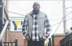  ?? Lake Fong/Post-Gazette ?? Aaron Gibson, a YMCA regional executive director, oversees the Centre Avenue and Thelma Lovette branches.