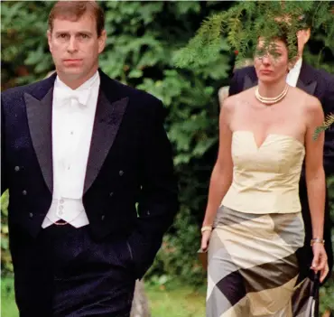  ??  ?? Friendship: Andrew with Ghislaine Maxwell at a society wedding in Wiltshire in 2000