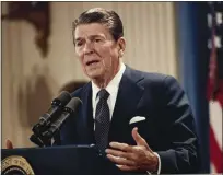  ?? J. SCOTT APPLEWHITE — THE ASSOCIATED PRESS ?? President Ronald Reagan speaks during a news conference at the White House in Washington in 1983.