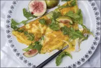  ?? Washington Post photo by John McDonnell ?? Fig and Brie Omelets. Nutrition | Per serving: 560 calories, 26 g protein, 41 g carbohydra­tes, 33 g fat, 14 g saturated fat, 425 mg cholestero­l, 540 mg sodium, 3 g dietary fiber, 37 g sugar.