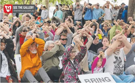  ?? Picture: PATRICK GEE ?? SOLIDARITY: Hundreds turned up to Salamanca Lawns to protest the treatment of refugees on Manus Island.