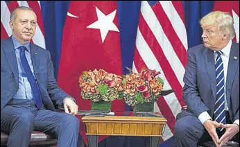  ?? AFP FILE ?? Growing distance: Turkey President Recep Tayyip Erdogan and US President Donald Trump wait for a meeting at the Palace Hotel during the UN General Assembly in New York in September.