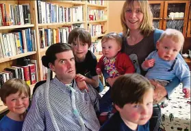  ??  ?? Bond: Simon Fitzmauric­e with his wife Ruth and five children