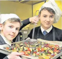  ??  ?? ●● Clockwise from above: Matt Sherratt and Leo Skinner serve up the vegetables; Henry Ives and Daniel Bergman get to grips with the produce; Will Jones and Will Kemp whisk up a treat for their guests; and inset, Marcus Nowat checks the seasoning