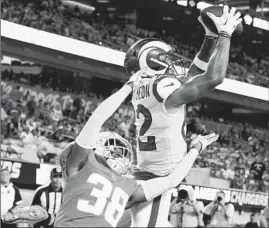  ?? Robert Gauthier Los Angeles Times ?? LANCE McCUTCHEON beats cornerback Brandon Sebastian on one of his two touchdown catches for the Rams in Saturday’s preseason win over the Chargers.