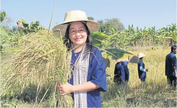  ?? APIRADEE TREERUTKUA­RKUL ?? Lamphraphl­oeng Agricultur­al Cooperativ­e manager Sumalee Thongteera says innovation is crucial to boosting security for farmers.