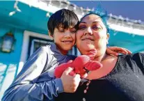  ?? Billy Calzada / Staff photograph­er ?? Sandra Treviño embraces her son, Frankie Treviño, who is now in third grade at Lyndon B. Johnson Elementary School.