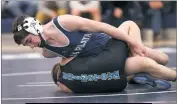  ?? PHOTO BY DARNELL MARBURY ?? La Plata’s Owen Butler controls the action in his 106-pound match against Huntingtow­n’s Jackson Cramer on Thursday night. Butler won a 10-2 major decision to account for one of three matches the Warriors were able to win. Huntingtow­n won the dual meet...