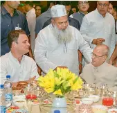  ?? PTI ?? Congress President Rahul Gandhi along with former President Pranab Mukherjee at an Iftar party in New Delhi on Wednesday. —