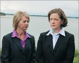  ?? Calgary Herald Archive ?? Environmen­t Minister Diana McQueen, left, and Alberta Premier Alison Redford at the Dickson Dam for a news conference to talk about the oil spill from a pipeline leak.