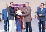  ??  ?? Ajay Kashyap, DG, Tihar giving away the awards to the prisoners as well as the jail officials