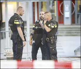  ??  ?? Police patrol the Maassilo concert venue in Rotterdam on Wednesday. AFP