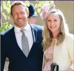  ??  ?? ROYAL GUEST: Jonny Wilkinson and wife Shelley at Prince Harry’s wedding