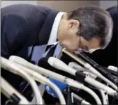  ?? THE ASSOCIATED PRESS ?? Japanese air bag maker Takata Corp. CEO Shigehisa Takada bows at the beginning of a press conference in Tokyo on Monday,. Takata Corp. has filed for bankruptcy protection in Tokyo and the U.S.