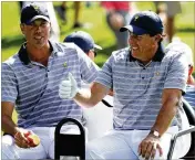  ?? GETTY IMAGES ?? Phil Mickelson (right, with Matt Kuchar during practice rounds Wednesday) has represente­d the U.S. in every Ryder Cup and Presidents Cup since 1994.