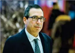  ?? EDUARDO MUNOZ ALVAREZ/AFP ?? Steven Mnuchin, Donald Trump’s nominee for Treasury secretary, arrives at Trump Tower for meetings with the president-elect on January 2.