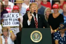  ?? AP Photo ?? RALLYING FANS: President Trump spoke to a crowd of supporters at a political rally in Phoenix Thursday.