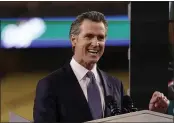  ?? MARK J. TERRILL — THE ASSOCIATED PRESS FILE ?? California Gov. Gavin Newsom delivers his State of the State address from Dodger Stadium in Los Angeles. Newsom and his Democratic allies launched a political committee Monday to stop a proposed recall election that could oust him from office.