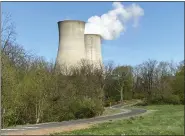  ?? EVAN BRANDT — MEDIANEWS GROUP ?? The cooling towers of the Limerick Generation Station nuclear power plant loom over a new section of the Schuylkill River Trail between Fricks Lock Village and Sanatoga road in East Coventry.