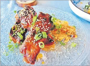  ?? KARL WELLS PHOTO ?? Fork’s Korean BBQ pork ribs.