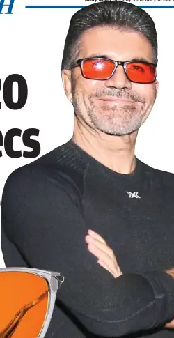  ?? ?? All smiles: Cowell in glasses