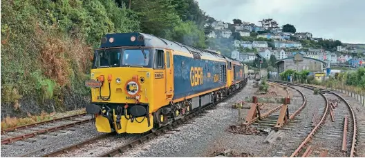  ?? Stephen Ginn ?? 50049 Defiance and 50007 Hercules depart from Kingswear with the returning ‘Champion Torbay Express’ tour on September 25, deputising for the failed D1015 Western Champion, which had originally been scheduled to haul the train. The Class 50s will run the Kingswear to Eastleigh charter as far as Gloucester, where they were replaced by GB Railfreigh­t 66749.