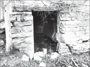  ?? Photo courtesy of Xyta Lucas ?? The barn remaining from the Wishing Spring Ranch still stands up on the hill above what is now McDonald’s on Peach Orchard Road. The springhous­e up there served the house that was part of that ranch, and the spring provided water that was gravity fed...