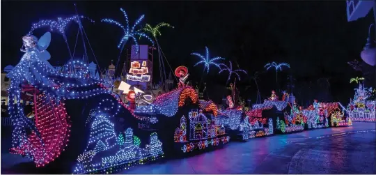  ?? COURTESY OF DISNEYLAND ?? Disneyland’s new Main Street Electrical Parade finale float has 16animated dolls in the artistic style of It’s a Small World. The longtime ride will not be incorporat­ing them, the park says.