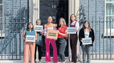  ?? ?? Campaigner­s delivered a petition to Downing Street opposing the drilling of oil and gas from the Cambo oilfield.