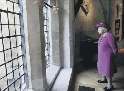  ??  ?? The Queen walks through The Queen’s Diamond Jubilee Galleries at Westminste­r Abbey in London.