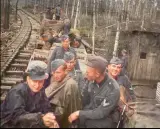  ?? ?? Polizei troops onboard a narrow railway. Note all the bottles of Vodka